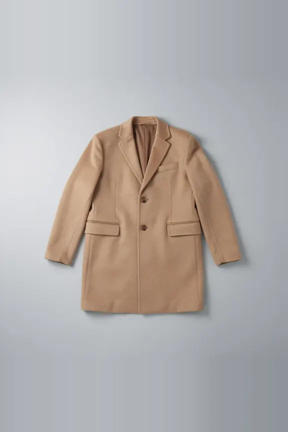 A camel wool overcoat, photographed flat.